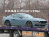 2024-ford-mustang-coupe-dark-horse-vapor-blue-metallic-k1-on-flat-bed-exterior-001