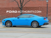 2024-ford-mustang-coupe-gt-grabber-blue-ae-with-optional-wing-spoiler-exterior-003