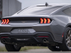 2024-ford-mustang-ecoboost-bronze-appearance-package-press-photos-exterior-005-rear-three-quarters-deck-lid-tail-lights-bronze-mustang-logo-badge-exhaust