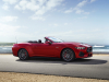 2024-ford-mustang-gt-convertible-exterior-001-side-front-three-quarters-top-down