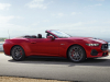2024-ford-mustang-gt-convertible-exterior-002-side-front-three-quarters-top-down