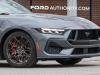 2024-ford-mustang-gt-coupe-carbonized-gray-bronze-package-black-and-red-stripes-first-real-world-photos-december-2022-exterior-008
