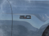 2024-ford-mustang-gt-exterior-010-passenger-front-fender-5-0-logo-badge