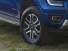 2023-ford-ranger-limited-europe-exterior-003-front-three-quarters-fog-light-goodyear-wrangler-territory-ht-tire-wheel-limited-logo-badge-running-board-assist-step