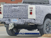 2023-ford-ranger-raptor-prototype-february-2021-014-rear-end-street-sweeper-rear-suspension-camouflage