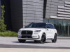 2023-lincoln-corsair-reserve-exterior-004-pristine-white-metallic-tri-coat-jet-appearance-package-front-three-quarters