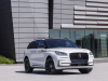2023-lincoln-corsair-reserve-exterior-019-pristine-white-metallic-tri-coat-jet-appearance-package-front-three-quarters