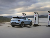 2024-electric-ford-explorer-europe-press-photos-exterior-030-side-rear-three-quarters-charger
