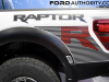2024-ford-f-150-raptor-r-2023-naias-oxford-white-yz-exterior-006-raptor-r-logo-badge-on-bedside