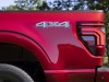 2024-ford-f-150-lariat-press-photos-exterior-005-4x4-logo-on-bedside-tail-light-detail