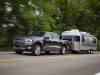 2024-ford-f-150-platinum-press-photos-exterior-006-side-front-three-quarters-towing