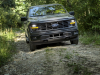 2024-ford-f-150-stx-press-photos-exterior-005-front-headlights-drl-daytime-running-lights-grille