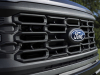 2024-ford-f-150-stx-press-photos-exterior-011-ford-logo-badge-on-grille
