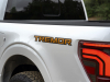 2024-ford-f-150-tremor-press-photos-exterior-012-tremor-logo-badge-on-bedside