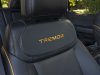 2024-ford-f-150-tremor-press-photos-interior-003-tremor-logo-badge-on-front-seat