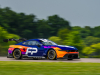 2024-ford-mustang-gt3-press-photos-exterior-005-side-front-three-quarters