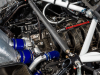 2024-ford-mustang-gt3-press-photos-exterior-031-engine-bay-2024-ford-performance-on-carbon-fiber-intake-manifold