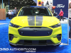 2024-ford-mustang-mach-e-rally-grabber-yellow-2023-naias-exterior-001-front-headlights-stripes