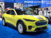 2024-ford-mustang-mach-e-rally-grabber-yellow-2023-naias-exterior-002-front-three-quarters