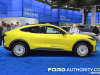 2024-ford-mustang-mach-e-rally-grabber-yellow-2023-naias-exterior-003-side