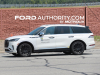 2024-lincoln-aviator-refresh-no-camouflage-white-first-on-the-road-photos-june-2023-exterior-003