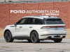 2024-lincoln-aviator-refresh-no-camouflage-white-first-on-the-road-photos-june-2023-exterior-006
