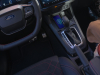 2024-ford-puma-press-photos-interior-004-center-console-wireless-phone-charger-gear-shift-selector