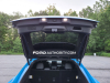 2021-ford-mustang-mach-e-first-edition-grabber-blue-fa-garage-cargo-area-trunk-002-liftgate-hatch