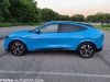 2021-ford-mustang-mach-e-first-edition-grabber-blue-fa-garage-exterior-003-side