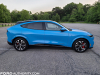 2021-ford-mustang-mach-e-first-edition-grabber-blue-fa-garage-exterior-007-side