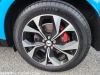 2021-ford-mustang-mach-e-first-edition-grabber-blue-fa-garage-exterior-012-19-inch-machined-face-aluminum-wheel-with-high-gloss-black-painted-pockets