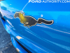 2021-ford-mustang-mach-e-first-edition-grabber-blue-fa-garage-exterior-025-black-mustang-logo-running-pony-grille