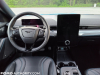2021-ford-mustang-mach-e-first-edition-grabber-blue-fa-garage-interior-005-cockpit-steering-wheel-digital-gauge-cluster-instrument-panel-vertical-sync-4a-infotainment-display-screen