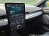 2021-ford-mustang-mach-e-first-edition-grabber-blue-fa-garage-interior-009-vertical-sync-4a-infotainment-display-screen