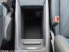 2021-ford-mustang-mach-e-first-edition-grabber-blue-fa-garage-interior-014-center-console-storage-area