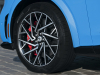 2021-ford-mustang-mach-e-gt-europe-exterior-010-front-wheel-red-brake-caliper