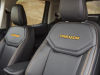 2023-ford-maverick-tremor-press-photos-interior-006-front-seats-tremor-logo-in-tremor-orange