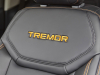 2023-ford-maverick-tremor-press-photos-interior-007-front-seats-tremor-logo-in-tremor-orange