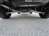 2023-ford-maverick-xlt-tremor-awd-avalanche-dr-fa-garage-review-exterior-018-undercarriage-exhaust-spare-tire