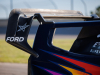 ford-supervan-4-2-press-photos-exterior-012-ford-script-on-wing