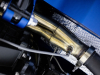 ringbrothers-patriarc-1969-ford-mustang-mach-1-press-photos-exterior-045-undercarriage-exhaust-header-manifold-02-sensor