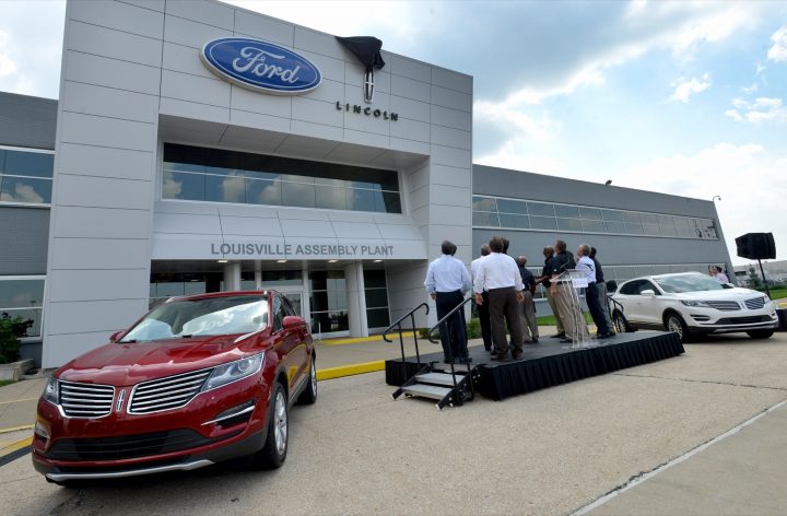 A pair of Lincoln MKC SUVs in front of Louisville Assembly plant