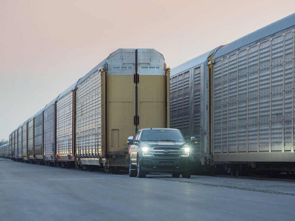 Ford F-150 EV prototype tows train cars