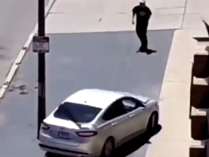 Ford Fusion Driver Runs Over Guy Throwing Rocks At Him Video