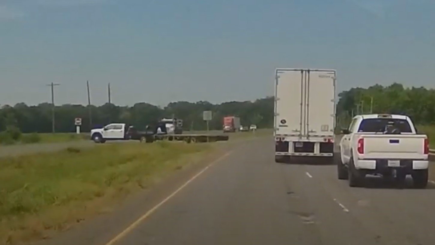 Ford Super Duty Loses Trailer In Dramatic Crash Crossing Road: Video