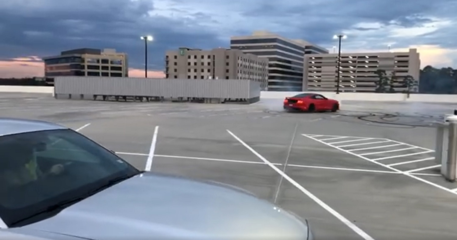 mustang driving circles around police car in parking lot｜TikTok