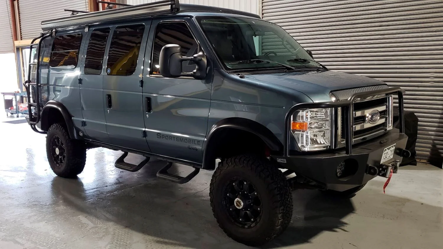 This 2013 Ford E-350 Sportsmobile Looks 