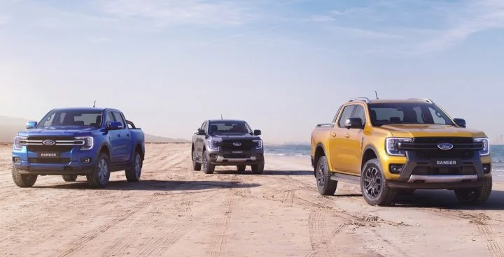 Three Next-generation Ford Ranger pickups on the beach