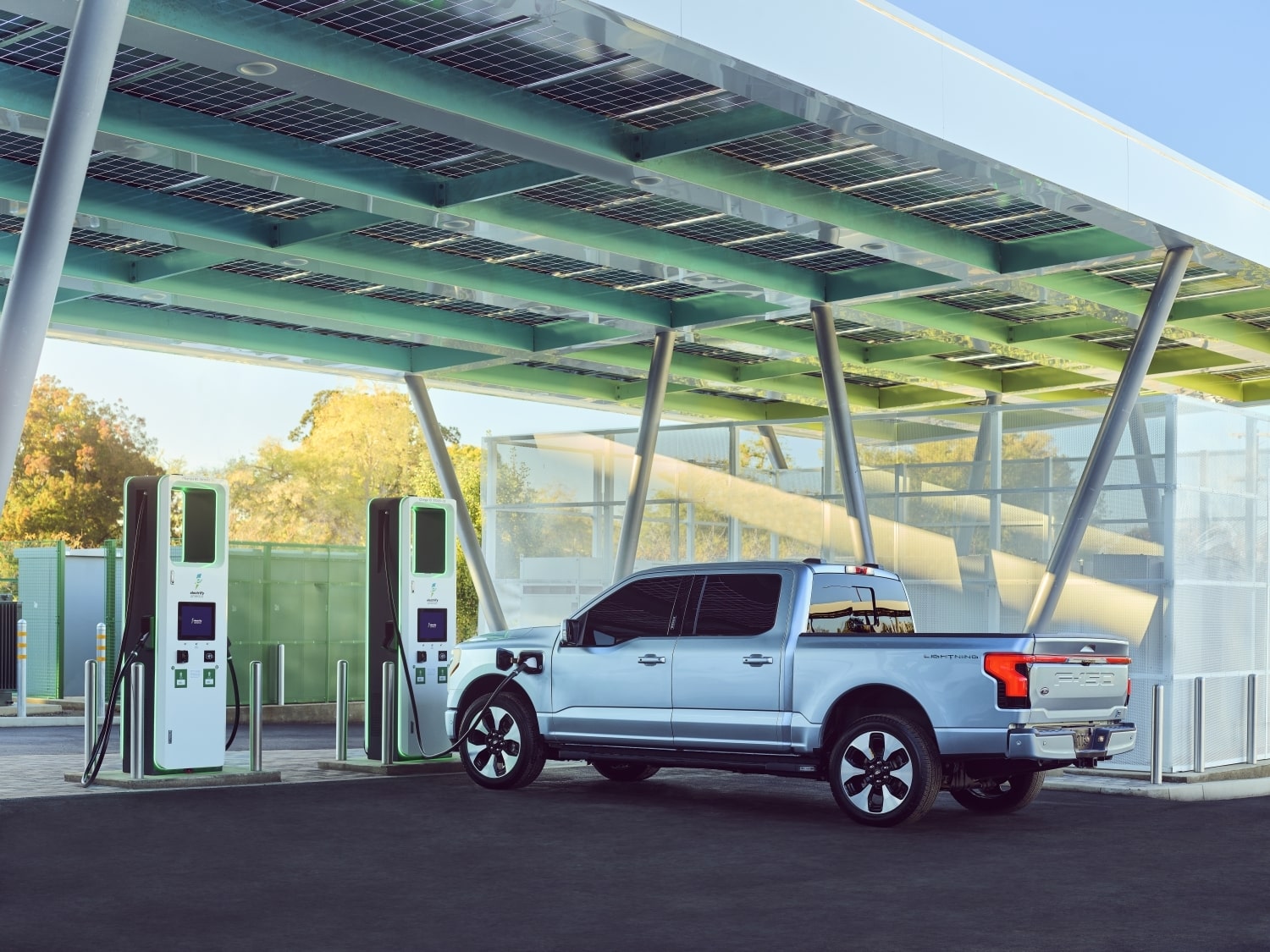 https://fordauthority.com/wp-content/uploads/2022/08/Ford-F-150-Lightning-Electrify-America-Charging-Station-Exterior-001-Rear-Three-Quarters.jpg