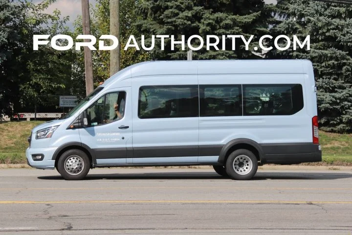 Side profile of Ford Transit Passenger Van with Dual Rear Wheels. Ford Transit discount offers employee pricing program in April 2025.